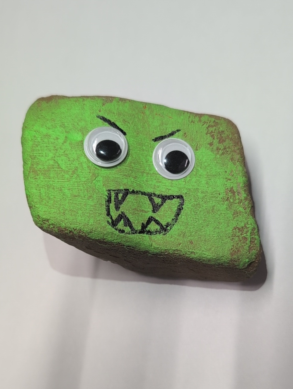 Hand-Painted Green Monster Rock with Googly Eyes